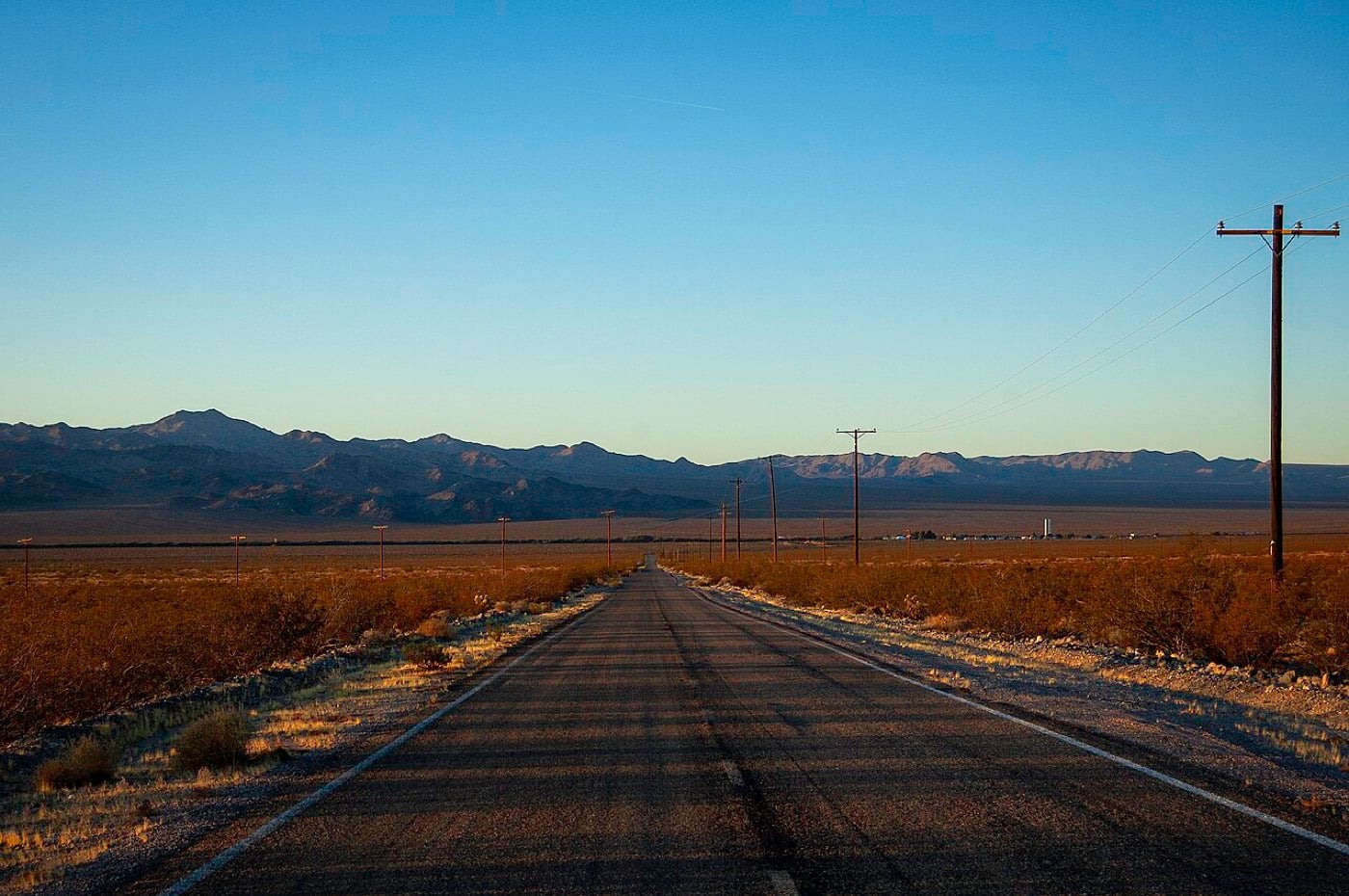 High Desert road at dusk near Phelan, California
